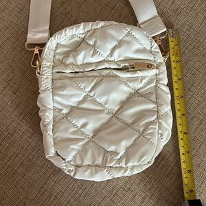 New with tags L.I.B. Puffy cross body purse. Cream Off white.